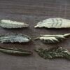 Pin Pluma Dorada 01